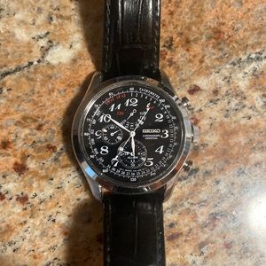 Black leather and Silver Seiko Watch